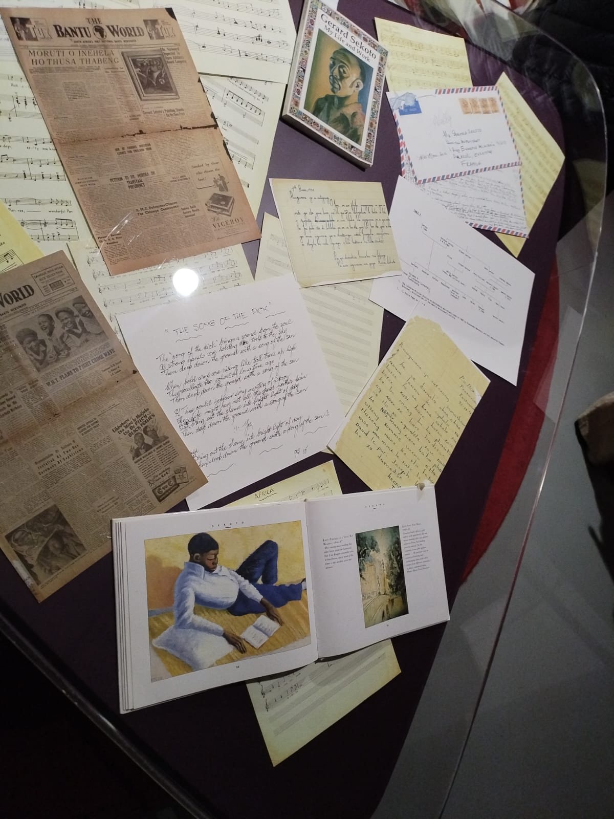 Archival writing, music and newspaper material displayed at the museum
