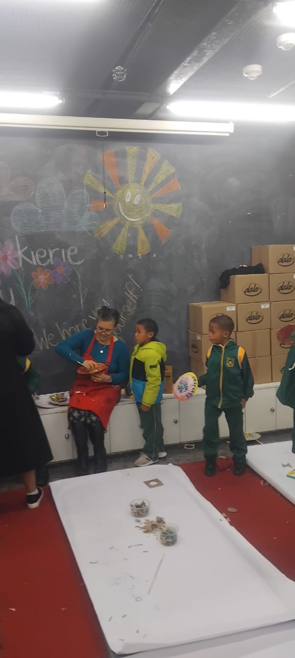 Children bringing storybook characters to life through hands-on creative work